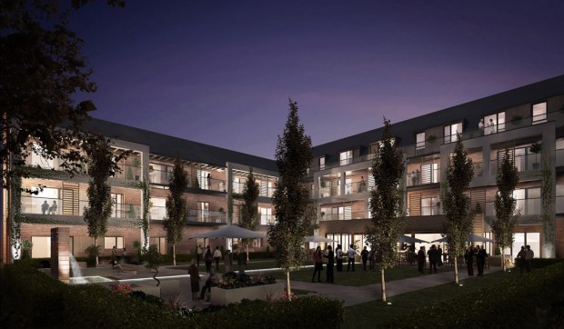 Photo of a courtyard and surrounding flats at night